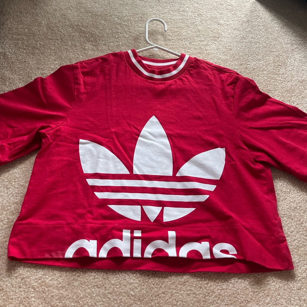 Red Adidas crop top with cut off logo: